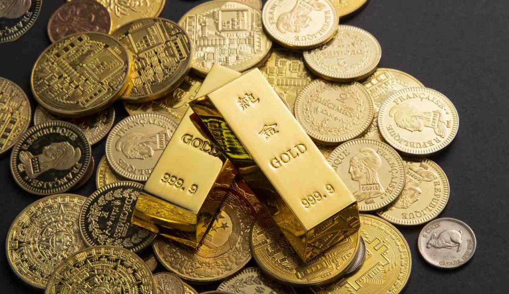 Monete e lingotti d'oro